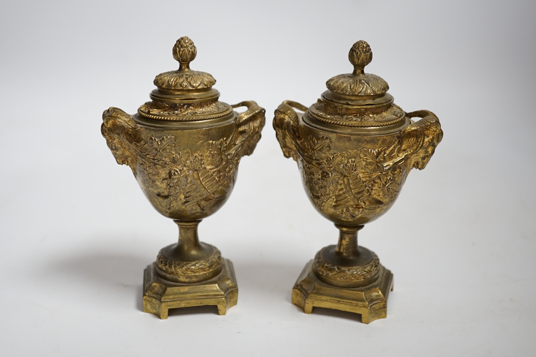 A pair of 19th century brass lidded vases, 15cm